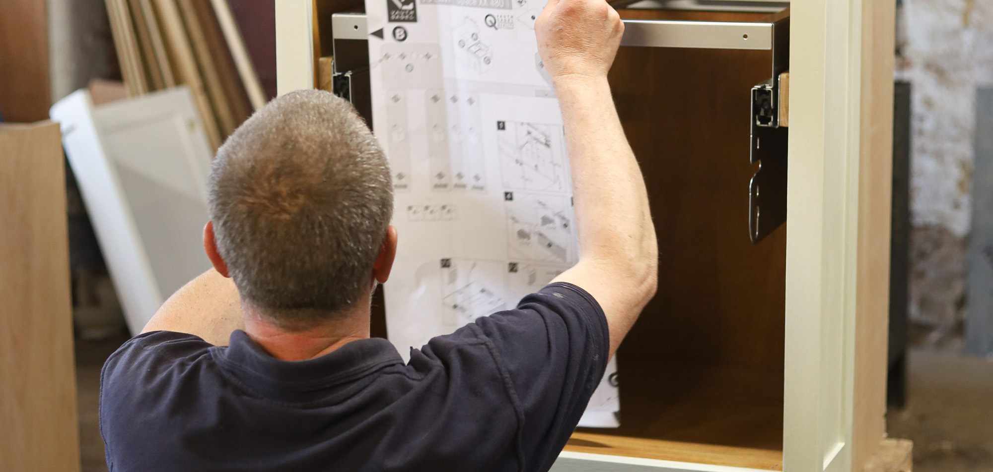 A man reading instructions